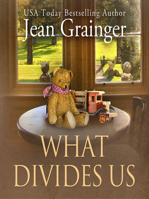 Title details for What Divides Us by Jean Grainger - Wait list